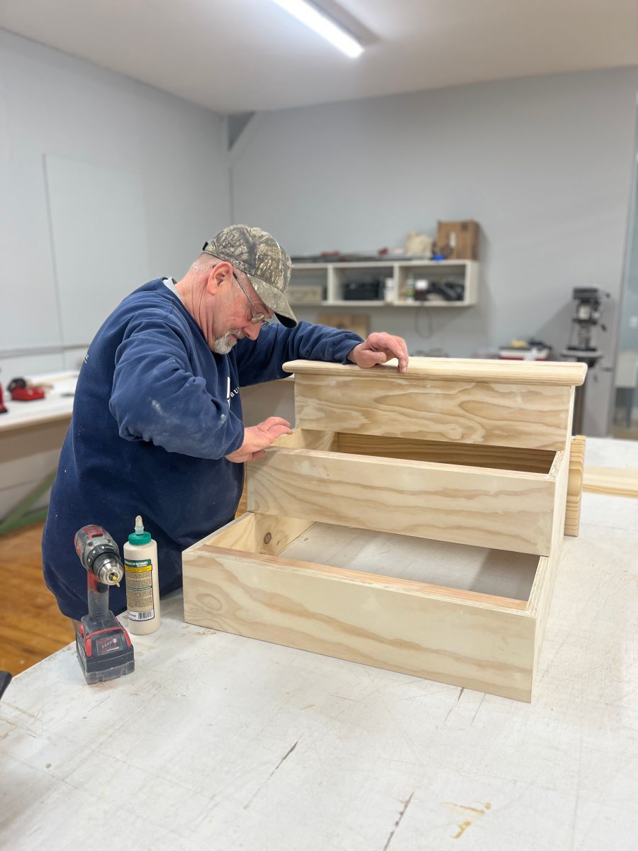 WBA finishing sanding on the gazebo for baby/crawler zone